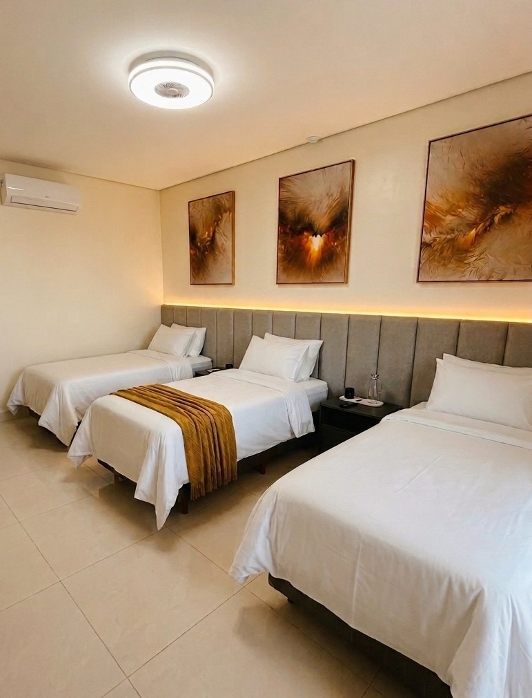 Habitación triple con tres camas simples